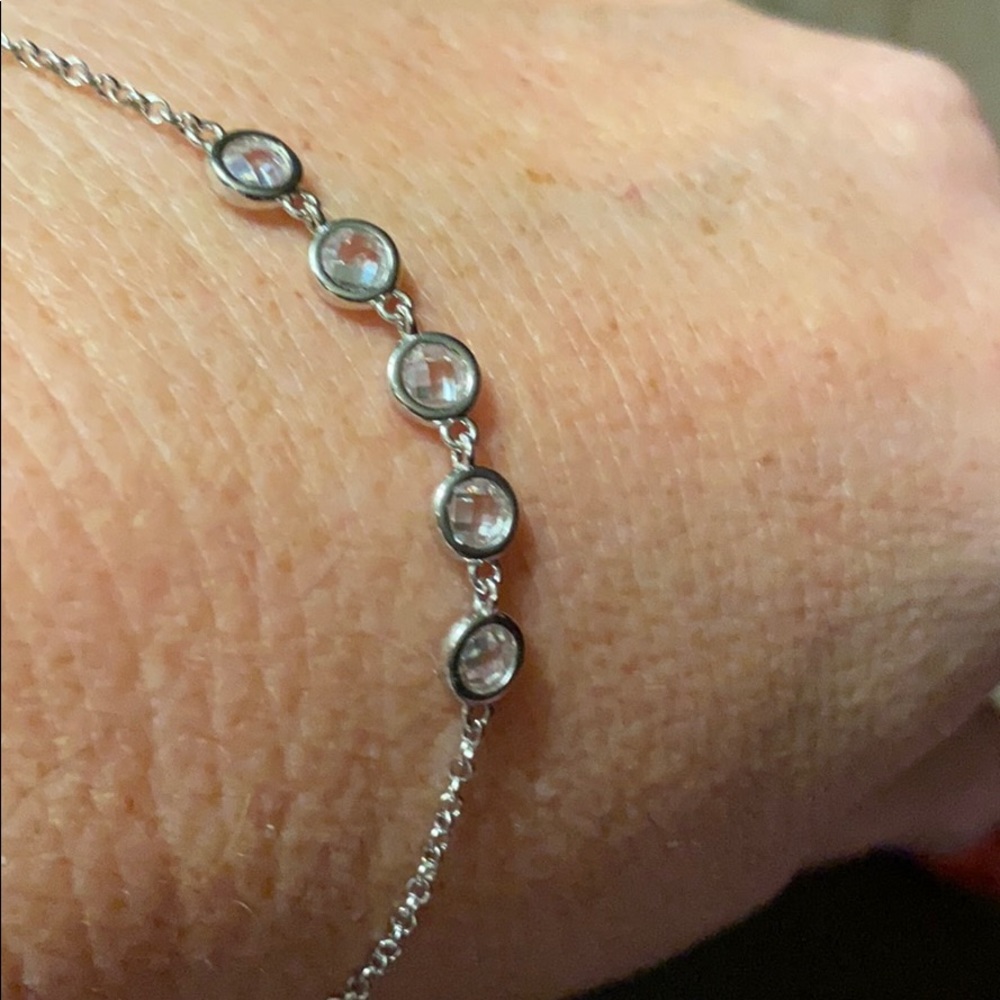 Sterling silver bracket with clear stones !